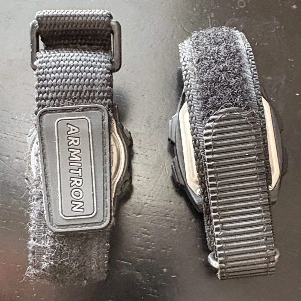 Armitron Black and Red Dual Smartwatches